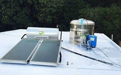 Calentador solar y cisterna de agua en Puerto Rico